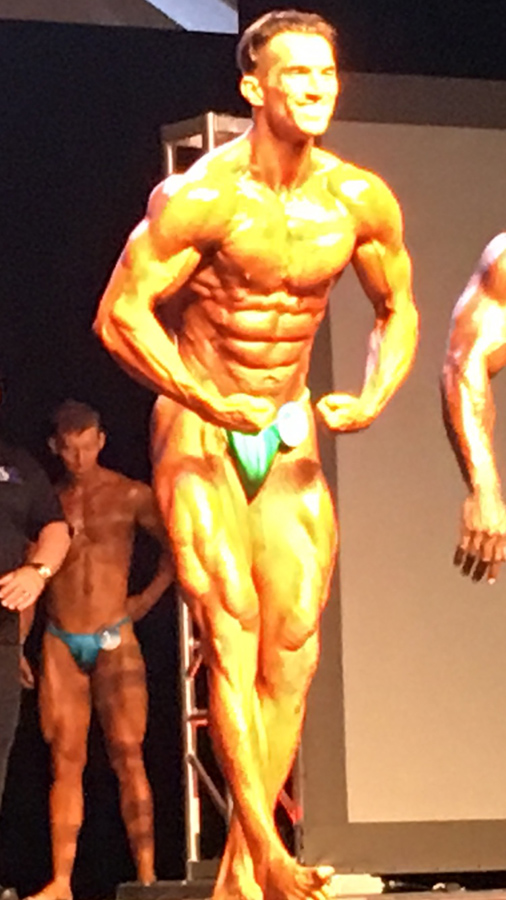 Seena Khonsari on Stage - Personal Trainer & 1st Place Heavyweight - Gold Medal Bodybuilding & Coach